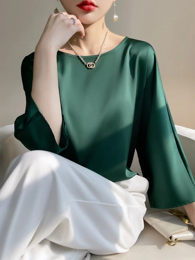 Blouse en satin vert émeraude