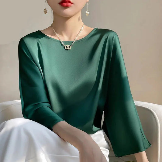 Blouse en satin vert émeraude